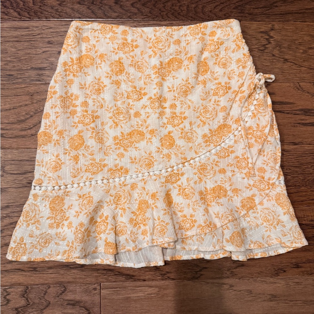 MINKPINK Asymmetrical Floral Skirt in Cream and Orange.